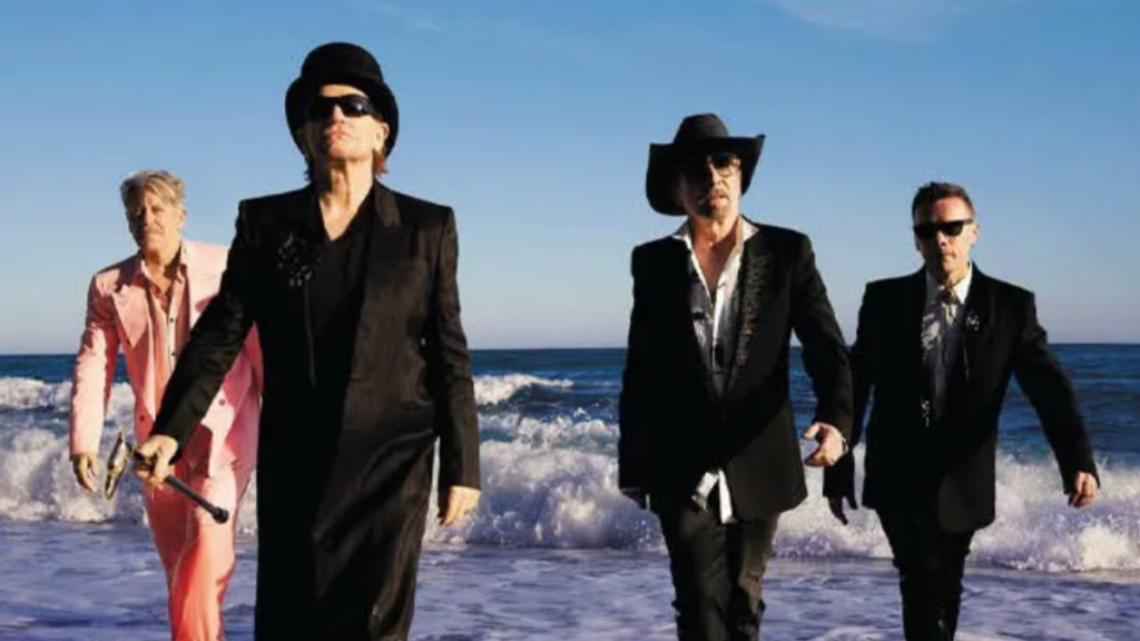 Banda U2 se apresentando ao vivo em um estádio